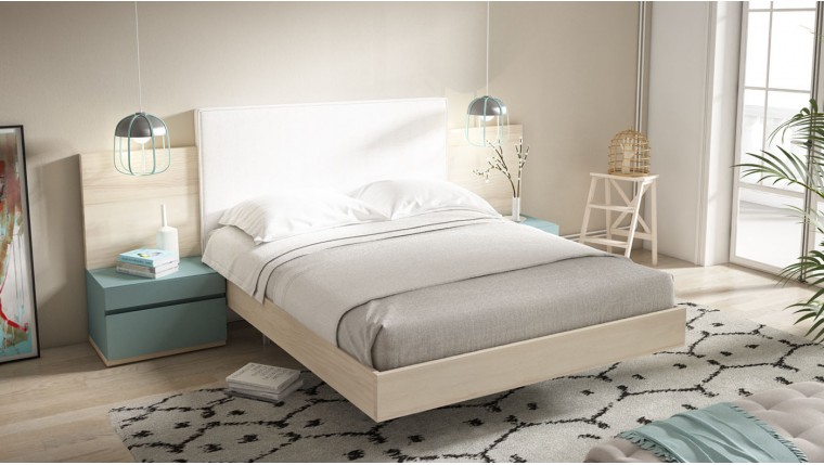 Dormitorio con cabezal tapizado